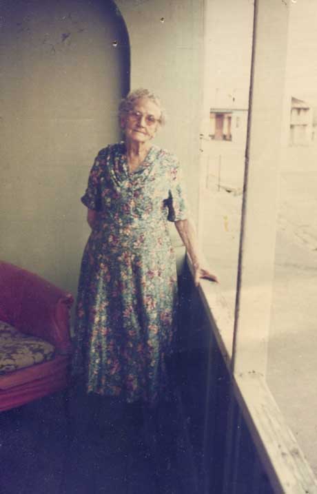 Nana Margaret Schofield on the verandah of her worker's cottage at Darlington, aged 82 in 1957