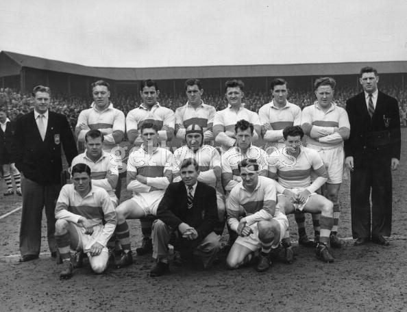 30th April 1955: Workington Town Rugby League team. From left to right and from the back row : A H Paskins, N Herbert, J Mudge, W Lymar, A Key, J Vickers, J Hayton, D Holland, W Wookey, Ike Southward, William Ivison (captain), E Gibson, W Ivil, D Moore, J Roper and K Faulder. Original Publication: Picture Post - 7708 - A Great Rugby League Final - pub. 1955 Photo by William Vanderson