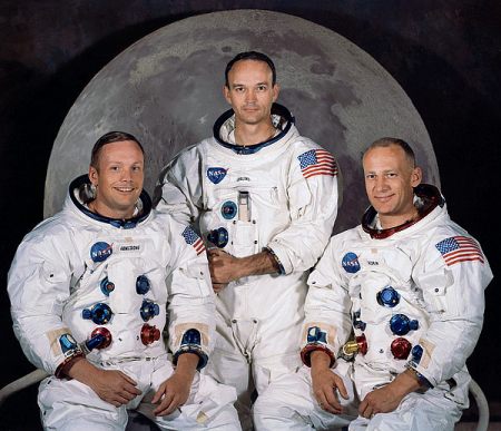 Neil Armstrong, Michael Collins and Buzz Aldrin, Apollo 11 crew. Neil Armstrong was the first man to step onto the moon, with Aldrin following twenty minutes later. Collins stayed behind to pilot the spacecraft they returned to after their landing.