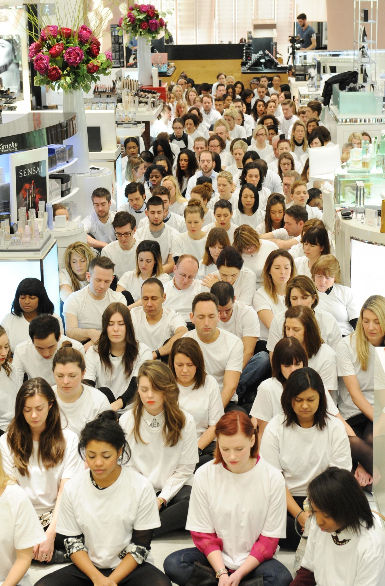 Five hundred people gather for a mass meditation led by Andy Puddicombe, Co founder of HEADspace and Alannah Weston, Selfridges Creative Director to launch No Noise at Selfridges on January 10, 2013 in London, England. (Photo by Stuart Wilson/Getty Images for Selfridges)