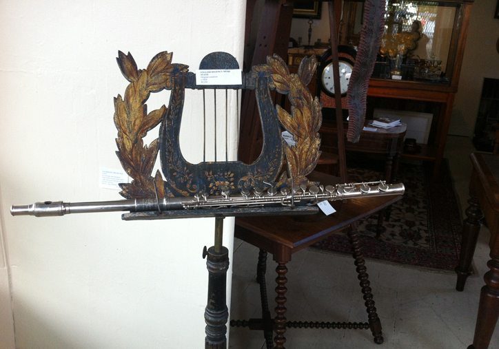 A fine quality and completely original English Regency period music stand of neo classical form. The base made of painted cast iron with gilded penwork for stability. The whole adjustable with original mechanism courtesy Warwick Oakman Antiques